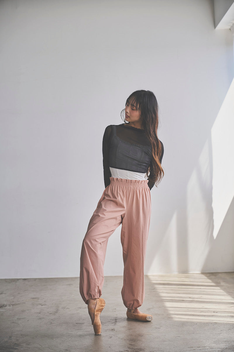 Retune. warm up pants / pink