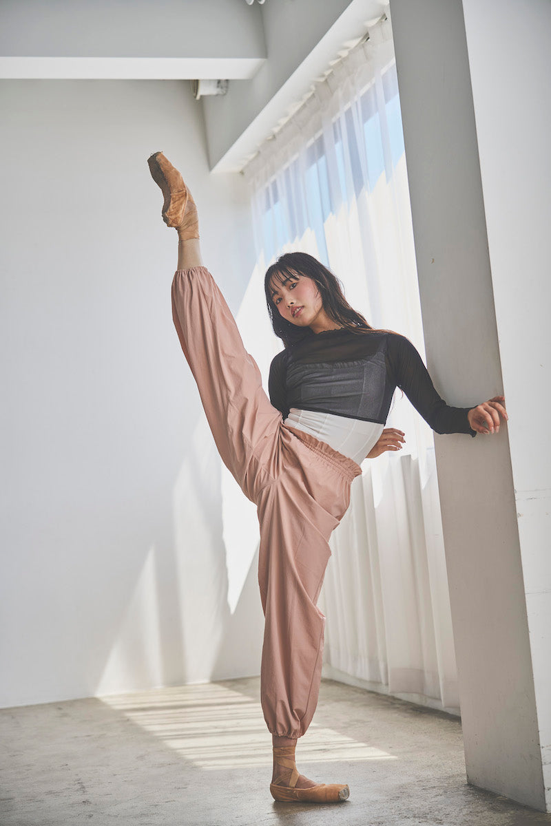 Retune. warm up pants / pink