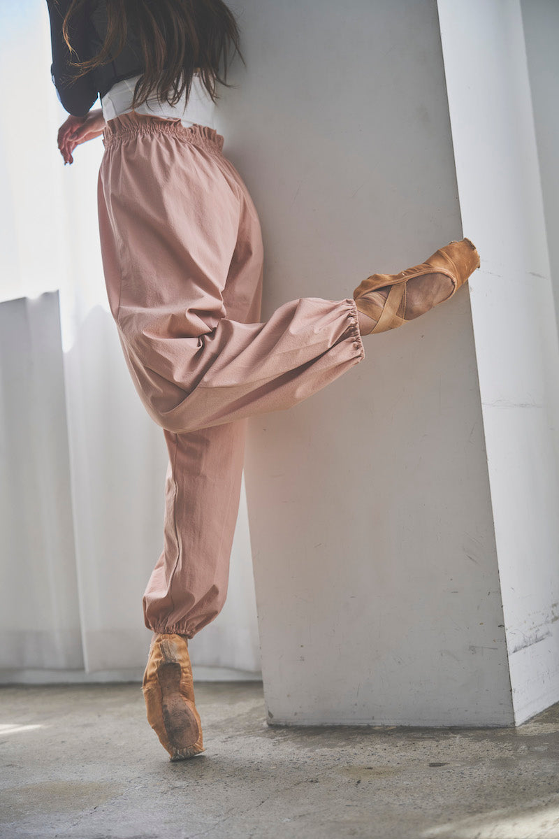 Retune. warm up pants / pink