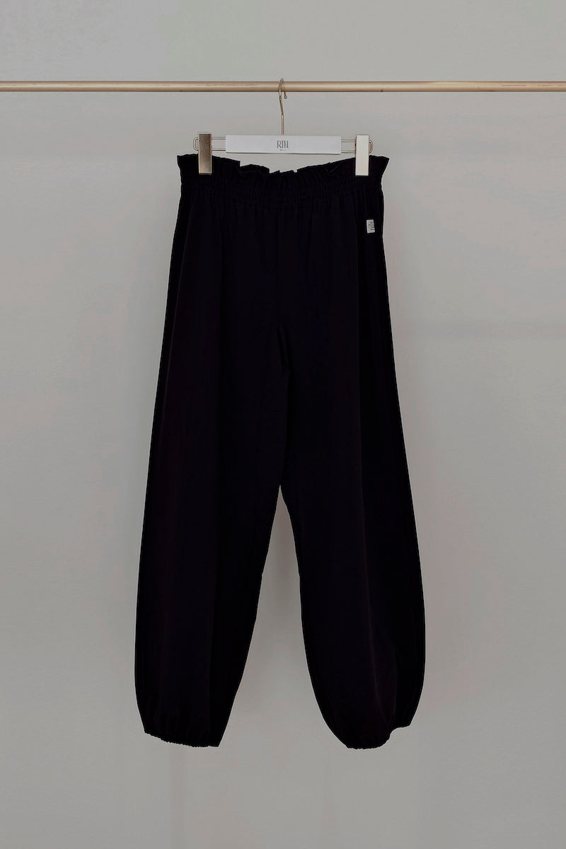 Retune. warm up pants / black