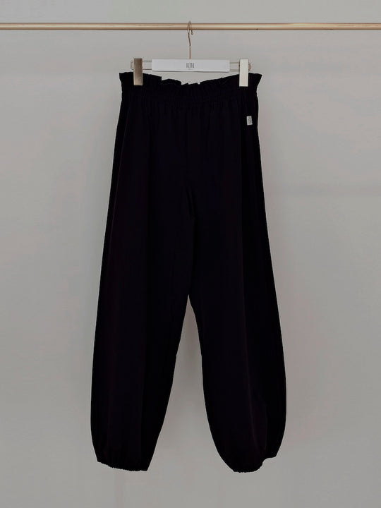Retune. warm up pants / black