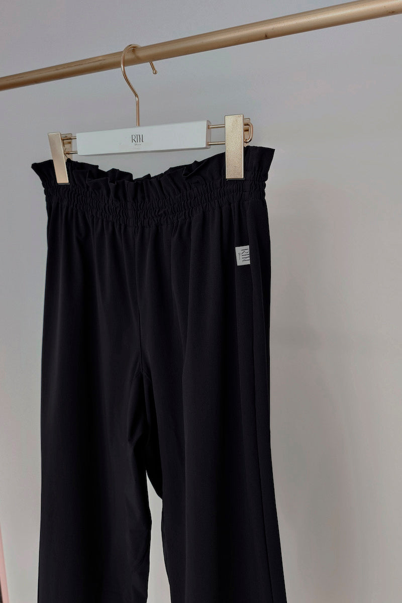 Retune. warm up pants / black