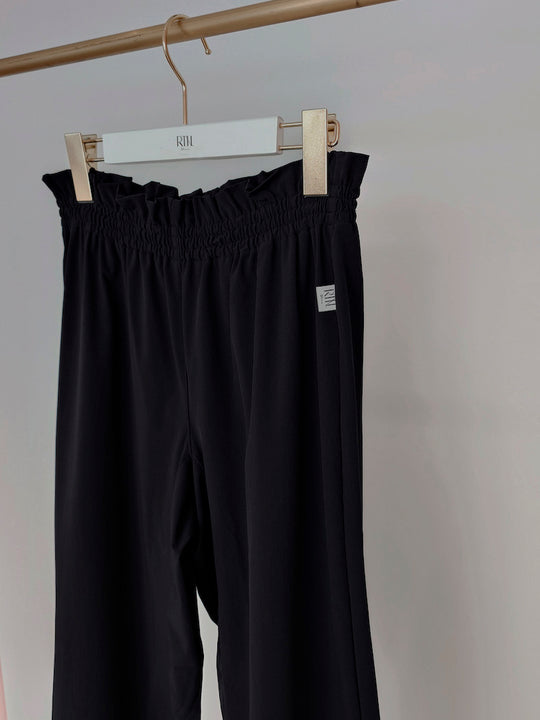 Retune. warm up pants / black