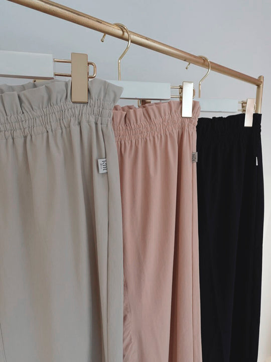 Retune. warm up pants / gray
