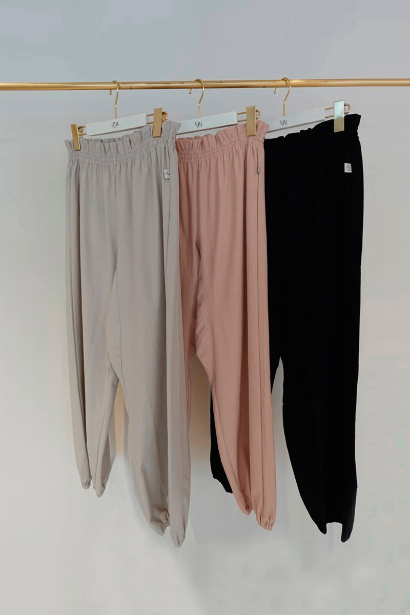 Retune. warm up pants / gray