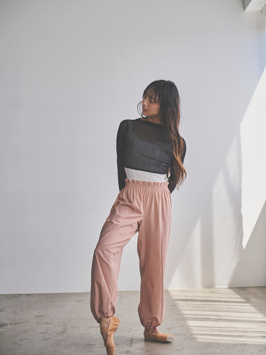 Retune. warm up pants / pink
