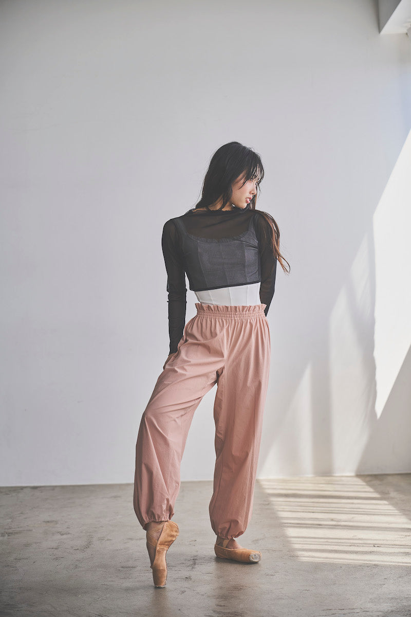 Retune. warm up pants / pink