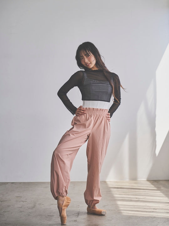 Retune. warm up pants / pink