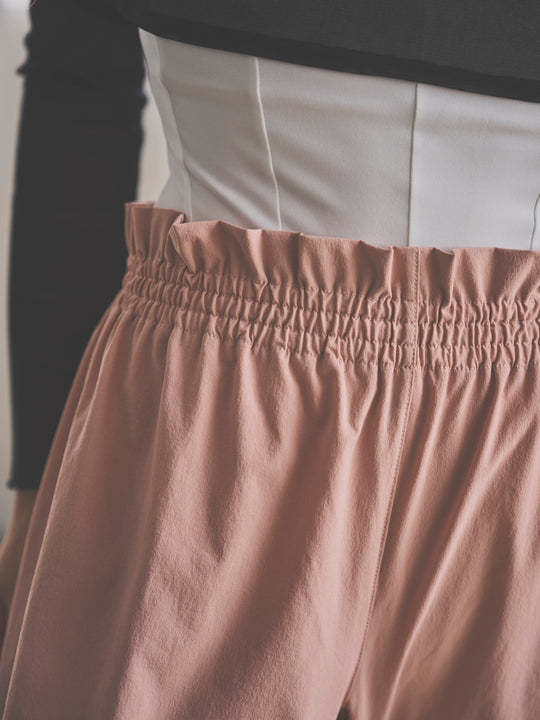 Retune. warm up pants / pink