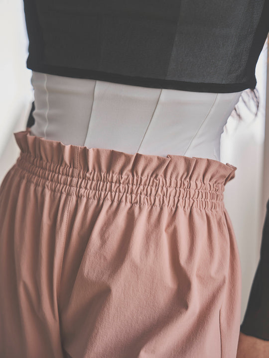 Retune. warm up pants / pink